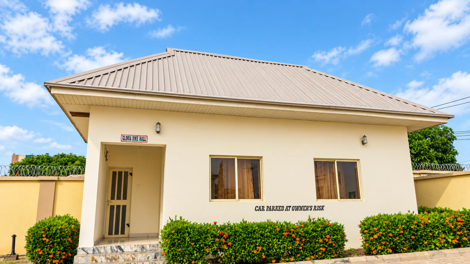 Exterior and entrance of Gloria Dike Hall at HASKE Hotel Luxury